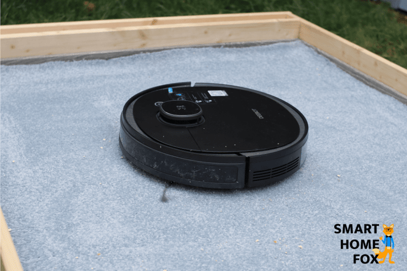 Deebot OZMO 950 пылесосит овсяные хлопья на ковре с высоким ворсом